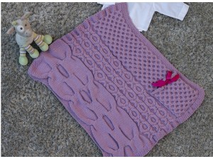 Cocoon la couverture pour bébé tricotée main